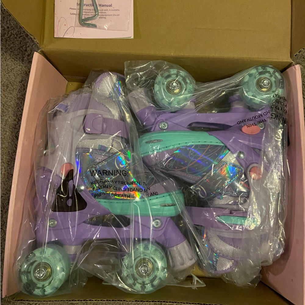 Brand NEW never worn RRIN Adjustable roller skates
